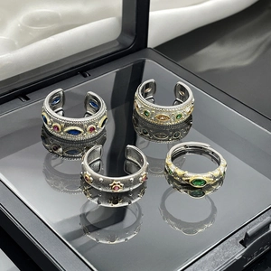Vintage palace style open rings with embossed relief, colorful gemstones and reflections
