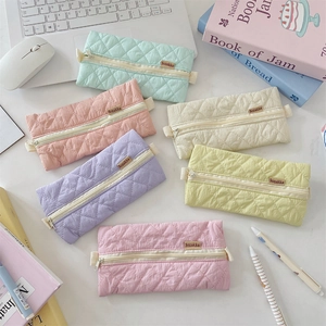 Pastel quilted pencil cases in macaron colors for stationery and cosmetics storage