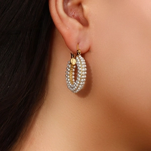 Classic 18K gold plated hoop earrings featuring multiple rows of small white pearls