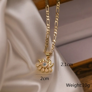 Gold-plated evil eye necklace with blue zircons and dimensions 2.1x2cm on silk
