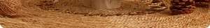Macro shot of natural woven fiber base with pine cones for mini Christmas tree setup