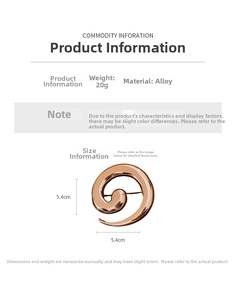 Detail view of rose gold spiral alloy brooch showing 5.4cm size and mirror finish