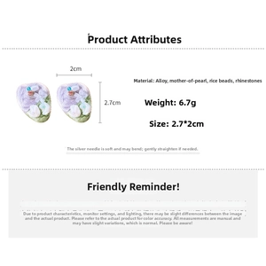 Detail view of vintage flower earrings with shell petals and colorful beads