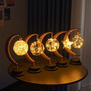 Moon-shaped LED iron decorative lamp with warm lighting and rustic hemp rope detail