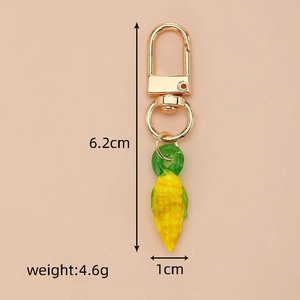 Miniature corn keychain charm dimensions showing 6.2cm height and 4.6g weight