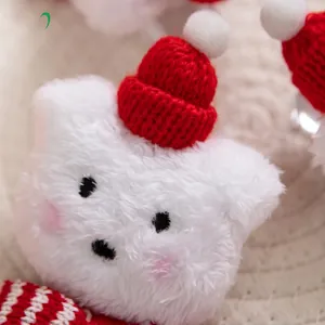 Cute white plush Christmas cat head pendant wearing a red knitted hat decoration