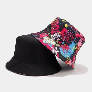 Detail of reversible graffiti bucket hat showing black solid color and vibrant street art print