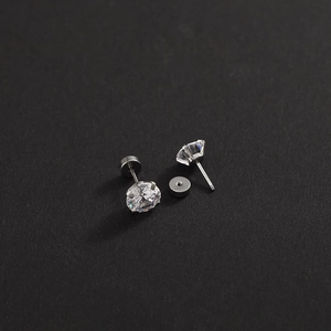 Polished titanium steel screw back earrings with clear zircon stones in four-prong setting