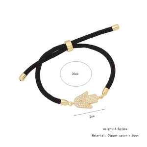 Tabella taglie dettagliata per bracciale Hamsa intrecciato nero con ciondolo in rame dorato