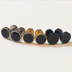 Detailed view of 8mm round stainless steel stud earrings in silver, gold, and black colors