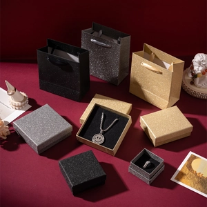 Glittery jewelry gift box and paper bag set in gold silver and black colors