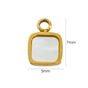 Macro shot of a 7mm by 5mm gold plated square pendant charm with white inlay