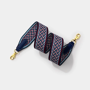 Fashionable woven wide shoulder strap with red blue wavy patterns and gold metal clasps