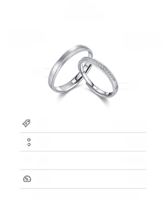 Detailed macro view of S925 sterling silver couple rings with brushed finish and inset stones