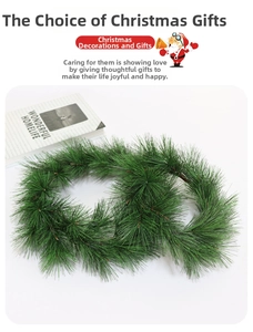 Close-up of PVC Christmas pine needle wreath with realistic green foliage and texture