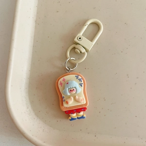 Close-up of a cute girl character in a toast bread design on an elegant tray