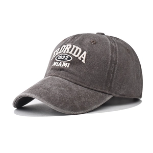 Close-up of Florida Miami 1822 embroidery on washed charcoal grey baseball cap