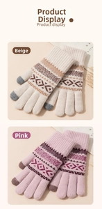 Detail of winter knitted gloves in beige and pink with touchscreen tips and geometric texture