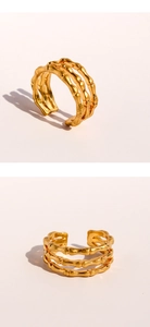 Detail view of triple-layered golden bamboo texture adjustable open ring for women