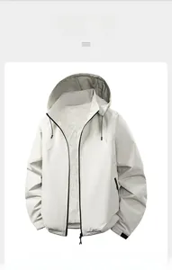 Close-up of men hooded jacket with white fleece lining and windproof outer fabric