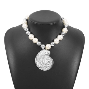 Marine style necklace with white faux pearls and a large silver nautilus shell pendant