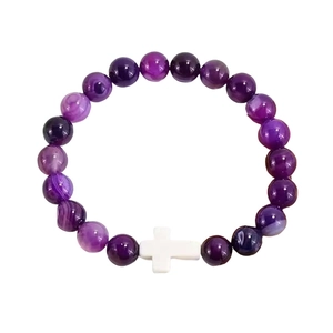Handmade purple agate beaded bracelet with a white turquoise cross pendant on white background