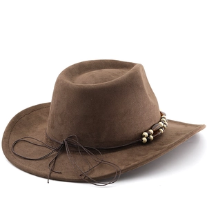 Detail of western brown felt hat featuring ethnic wooden beads and turquoise accents