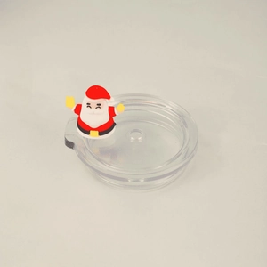 Close-up of a transparent lid featuring a cute Santa Claus decorative figure on top