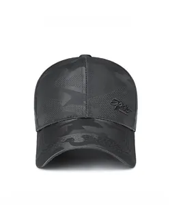 Detailed view of the Sport embroidery and camouflage pattern on a black baseball cap