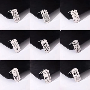 Polished stainless steel military dog tag keychains with various inspirational engravings
