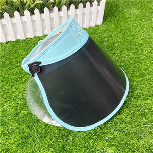 Detail of adjustable sun visor with M-Sport embroidery and blue fabric brim for outdoor use