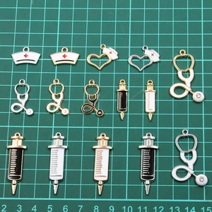 DIY medical alloy charms set featuring nurse hats and stethoscopes with gold finish