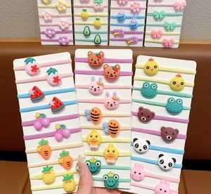 Close-up of children's high-elastic hair ties with colorful resin cartoon charms