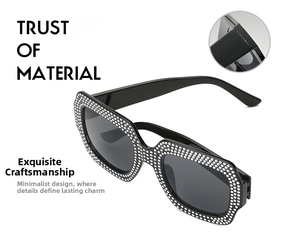 Detail shot of black square sunglasses featuring luxury rhinestones and gray lenses