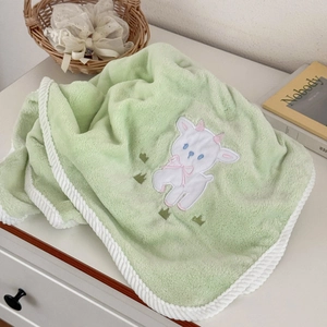 Green lamb bath towel with cute sheep embroidery and soft coral fleece texture