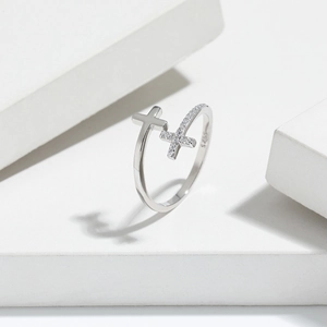 Detail shot of S925 sterling silver stamp and micro-inlaid double cross ring design