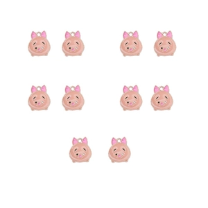 Detailed view of ten pink enamel pig pendants with gold trim and cute bows for DIY jewelry