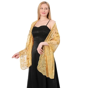 Detailed view of elegant gold sequin embroidered shawl for evening gowns and parties