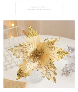 Detailed view of golden artificial Christmas flowers with sequins in a decorative vase
