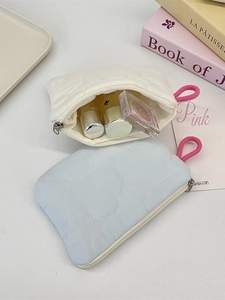 Quilted cloud cosmetic coin pouch in cream and light blue with pink braided wrist strap