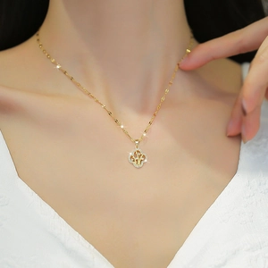 Titanium steel four-leaf clover necklace with sparkling zircon pavé on female model