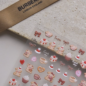 Detail showing 3D embossed coffee bear stickers with glossy textures and cute patterns