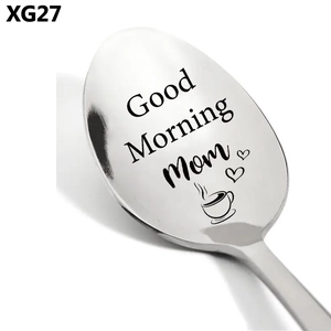 Macro shot of stainless steel spoon head with Good Morning Mom text and heart icons