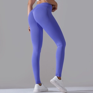 Detail view of seamless yoga leggings showing high waist and peach butt lifting effect