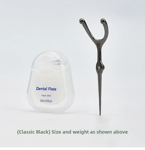 Close-up of portable Y-shape stainless steel dental floss holder with 50m mint floss case