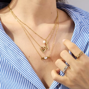 Gold layered MAMA necklace set with pearl pendants and matching alphabet rings