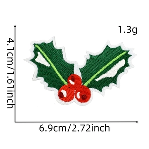 Detail of holly berry Christmas patch showing 6.9cm width and 1.3g weight dimensions