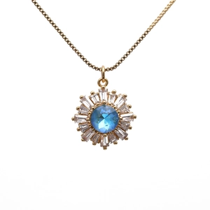 Golden sunflower necklace with central blue sapphire and sparkling zircon crystals