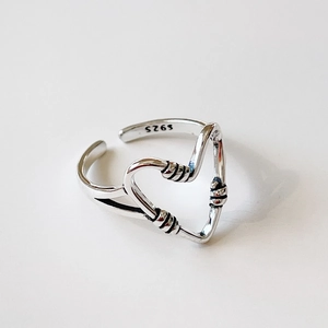 Minimalist S925 sterling silver knotted heart open ring for women on neutral background