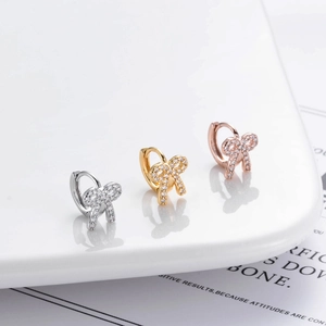 Bowknot hoop earrings with zircon pavé in silver, gold, and rose gold finishes